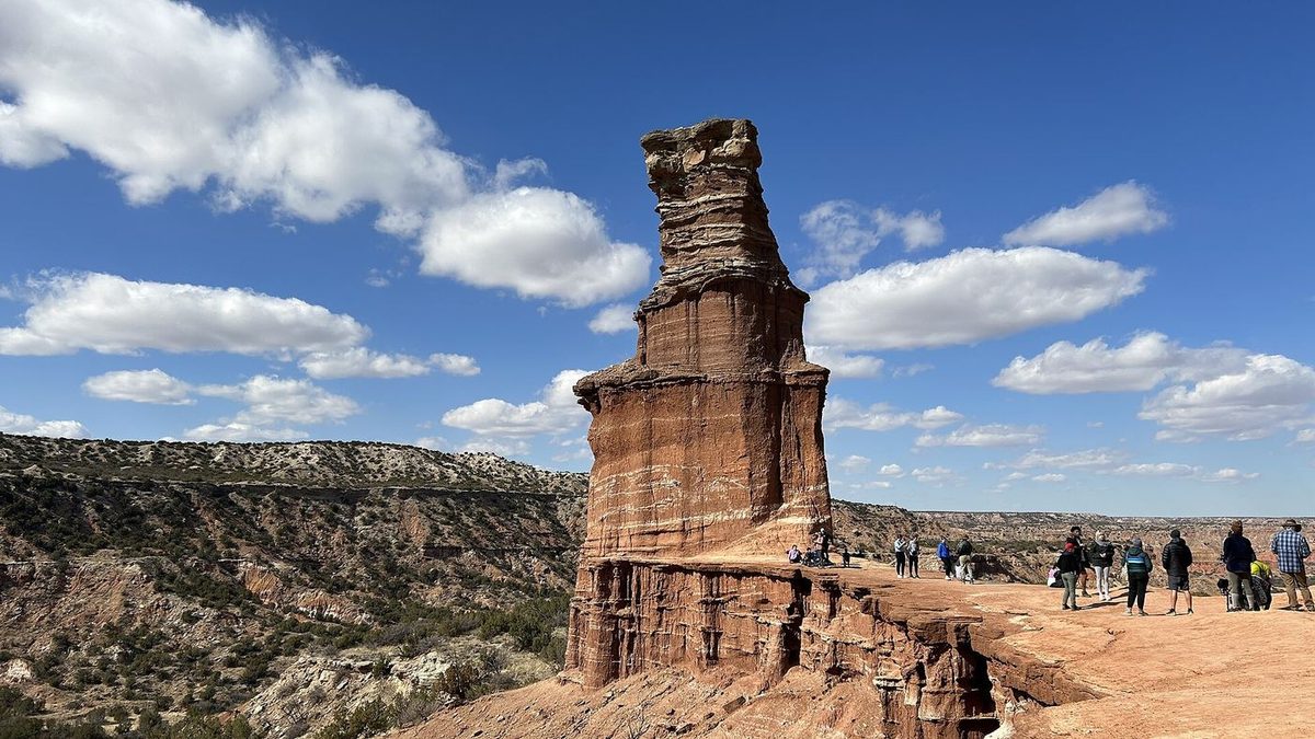 The Lighthouse rock tower in Palo Duro Canyon under a blue Texas sky