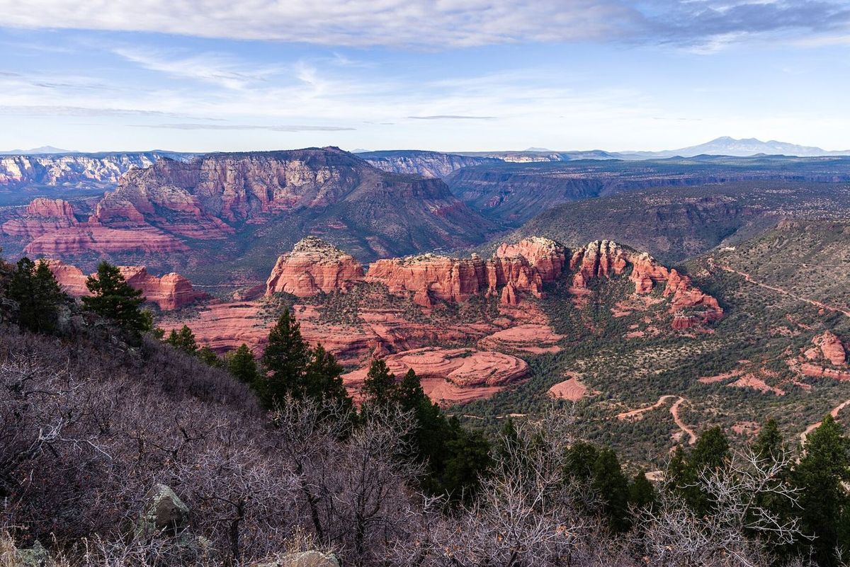 Red rock buttes and dirt roads below the rim in the Sedona backcountry